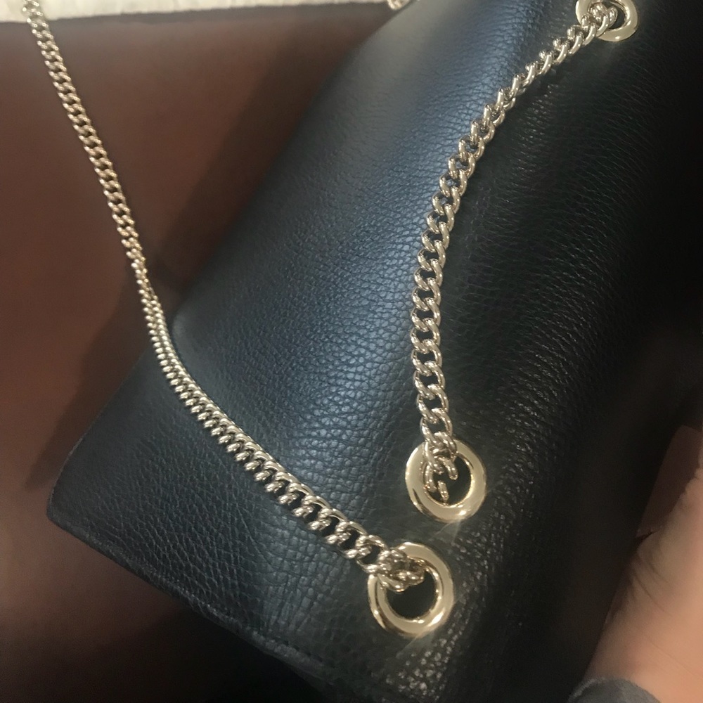 Gucci leather crossbody with interlocking G lock